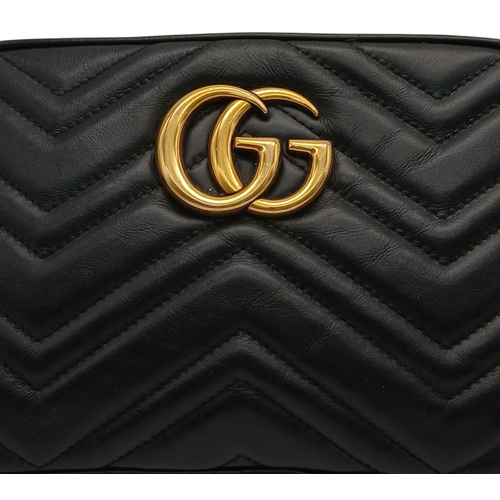 298 - A Gucci Black Matelassé Leather GG Marmont Shoulder Bag. Black chevron-quilted leather exterior with... 