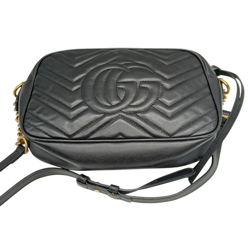 298 - A Gucci Black Matelassé Leather GG Marmont Shoulder Bag. Black chevron-quilted leather exterior with... 