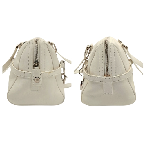 375 - A Christian Dior White Leather Shoulder Bag. White grained leather exterior with silver-toned hardwa... 