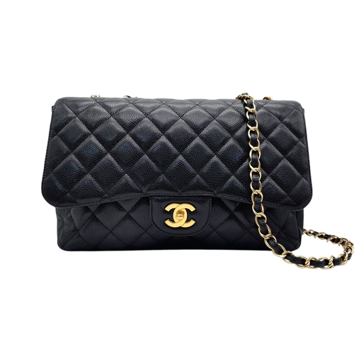 4 - A Chanel Black Caviar Leather Jumbo Classic Flap Bag. Black  caviar leather exterior with gold-toned... 