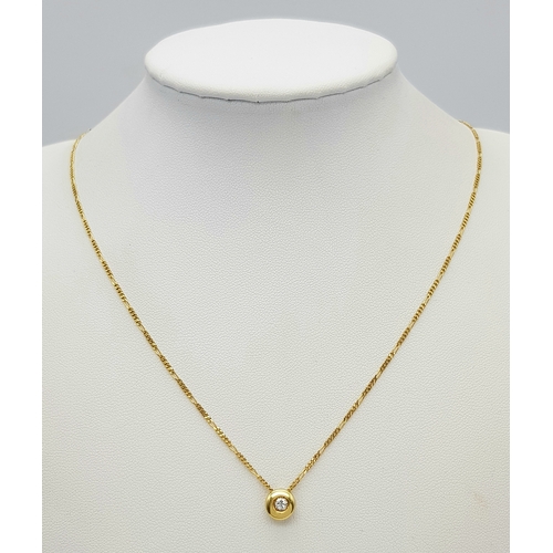 423 - A 14 Carat Gold Diamond Set Pendant on a 45cm Long 9 Carat Gold Chain. The Pendant is set with a 3mm... 