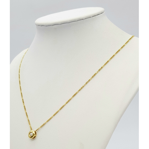 423 - A 14 Carat Gold Diamond Set Pendant on a 45cm Long 9 Carat Gold Chain. The Pendant is set with a 3mm... 