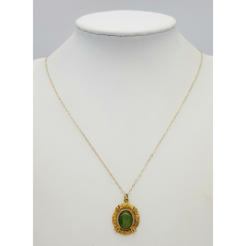 465 - A Vintage 1978 Hallmarked 9 Carat Gold Jade Set Ornate Design Pendant Necklace. 45cm Length. The Pen... 