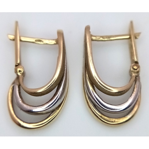 17 - A Pair of 9K Yellow and White Gold Earrings. 3.8g. 2cm