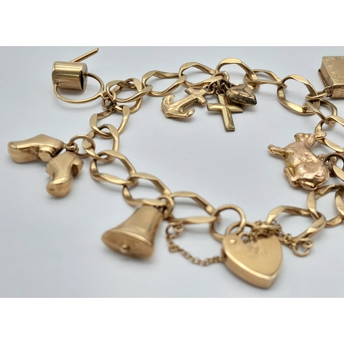 210 - Vintage 9 CARAT GOLD CHARM BRACELET Complete with Gold Safety Chain and Heart Padlock Clasp. Having ... 