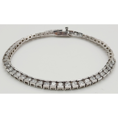 238 - Beautiful SILVER and ZIRCONIA TENNIS BRACELET. Having 54 Round Cut sparkling Zirconia Gemstones indi... 