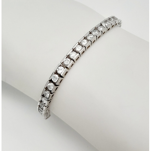 238 - Beautiful SILVER and ZIRCONIA TENNIS BRACELET. Having 54 Round Cut sparkling Zirconia Gemstones indi... 