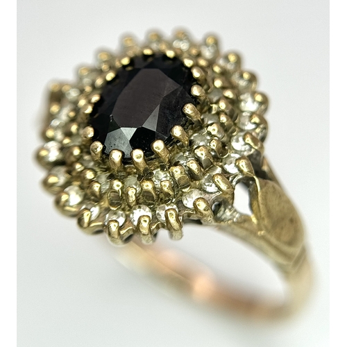 280 - Impressive Vintage 9 CARAT GOLD and DIAMOND RING. Having large oval cut SPINEL  mounted to top above... 