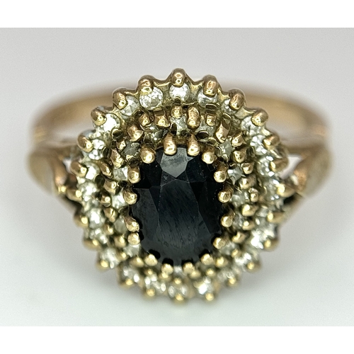 280 - Impressive Vintage 9 CARAT GOLD and DIAMOND RING. Having large oval cut SPINEL  mounted to top above... 