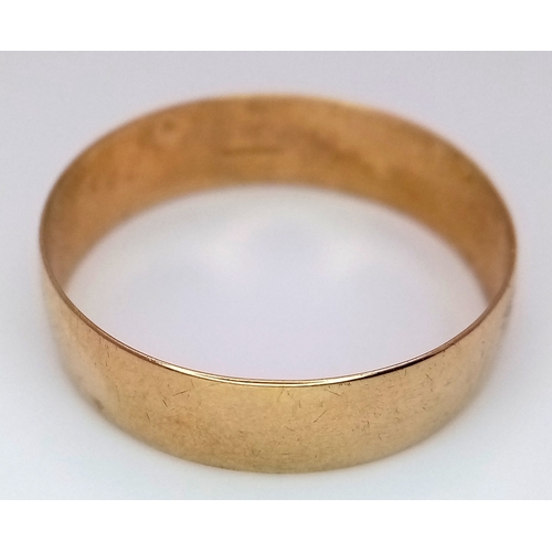 296 - A 9K Yellow Gold Band Ring - Full UK Hallmarks. 7mm. Size X. 2.34g