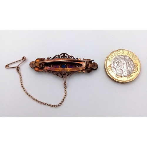 330 - A Beautiful Antique Edwardian 15K Gold, Sapphire and Diamond Brooch. Central set ice blue sapphire w... 