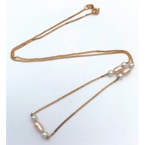 378 - Beautiful 14 CARAT GOLD CHAIN NECKLACE with Interspersed PEARL DETAIL. 2.3 grams. 42 cm.