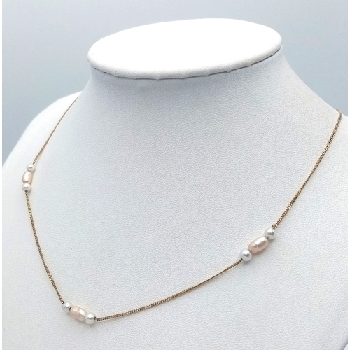 378 - Beautiful 14 CARAT GOLD CHAIN NECKLACE with Interspersed PEARL DETAIL. 2.3 grams. 42 cm.