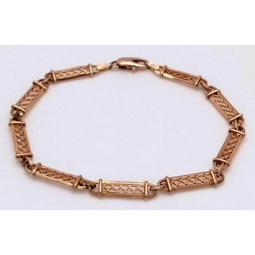 394 - A 9K YELLOW GOLD FANCY BRACELET, 5.4G TOTAL WEIGHT, 20CM TOTAL LENGTH. REF: 1480I