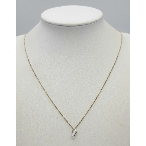 472 - An 18 Carat White Gold Three Diamond Set Pendant Necklace on a 9 Carat White Gold 46cm Length Chain.... 