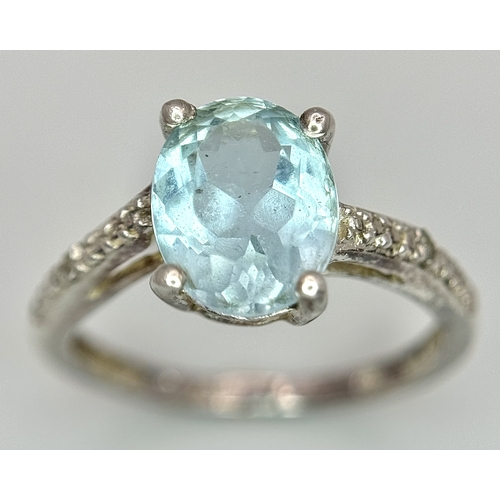 497 - An  Exquisite AQUAMARINE and DIAMOND, SILVER RING. Consisting a 1 CARAT OVAL CUT AQUAMARINE Mounted ... 