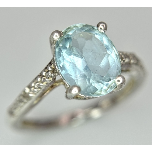 497 - An  Exquisite AQUAMARINE and DIAMOND, SILVER RING. Consisting a 1 CARAT OVAL CUT AQUAMARINE Mounted ... 