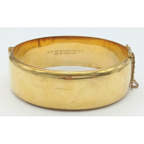 56 - Fabulous vintage Hinged 9 CARAT ROLLED GOLD BANGLE. Complete with safety chain. Beautifully decorate... 