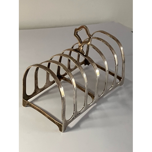 77 - Antique SILVER TOAST RACK. Clear hallmark for Adie Bros, Birmingham 1923.Approx 81 grams.