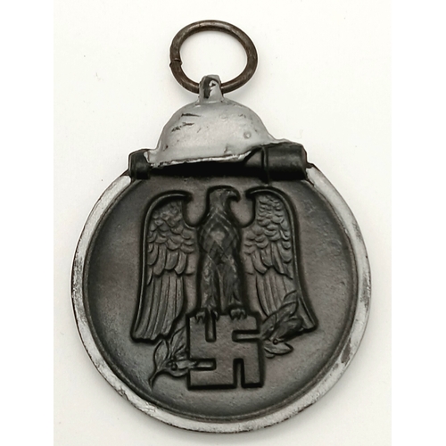 1268 - A WW2 German Eastern Front Medal. Un-issued in original packet.