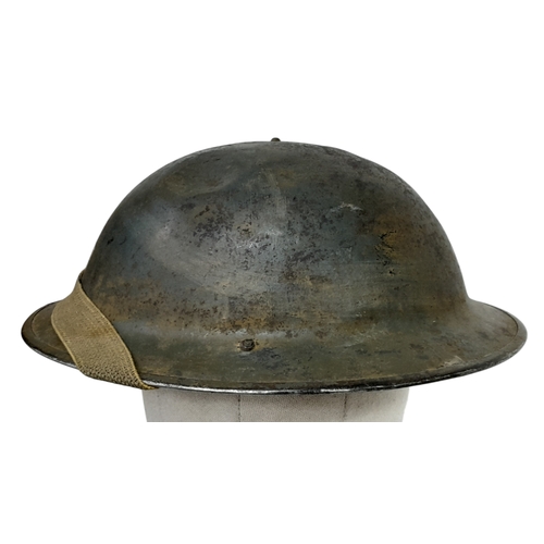 405 - A WW2 Royal Navy Sub Lt’s Helmet with chin strap and liner. Nice genuine “Been There” piece.