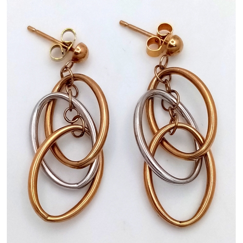 1358 - A pair of 9k gold, two tone oval drop earrings, 2.6g total weight. 1780I