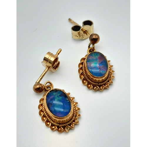 155 - A Pair of Vintage 9K Yellow Gold Opal Earrings. Opal cabochons with excellent colour-play. 1.7g