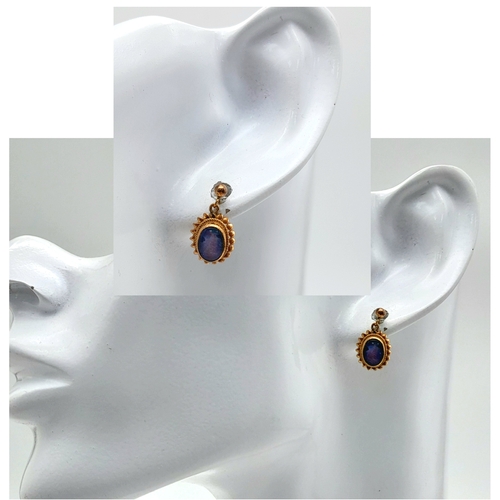 155 - A Pair of Vintage 9K Yellow Gold Opal Earrings. Opal cabochons with excellent colour-play. 1.7g