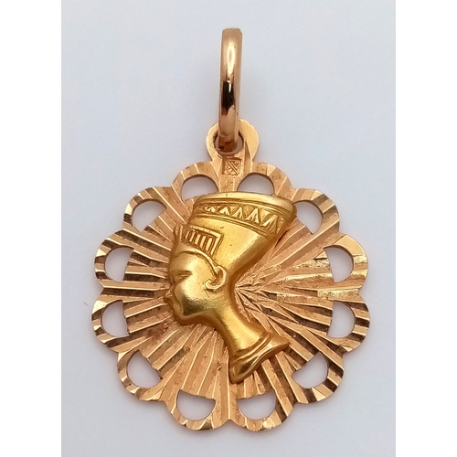 176 - An 18K Yellow Gold Egyptian Themed Pendant. 3cm. 1.87g.