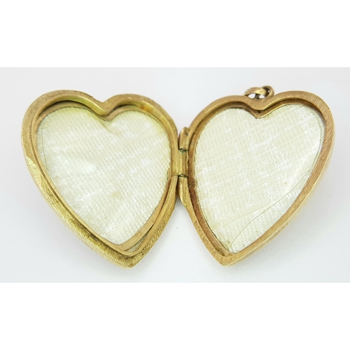 262 - A Vintage 9K Yellow Gold Heart Locket with Seed Pearl Decoration. 3cm. 5.3g