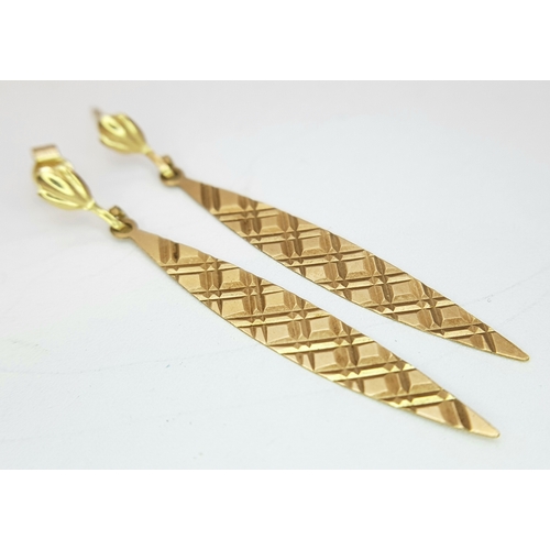 289 - Two Different Style Pairs of 9K Yellow Gold Earrings. 1.4g