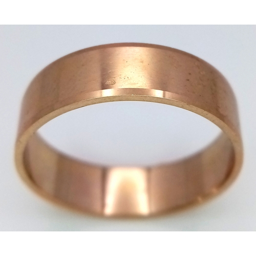 338 - A 9K Yellow Gold Band Ring. 6mm width. 4.15g