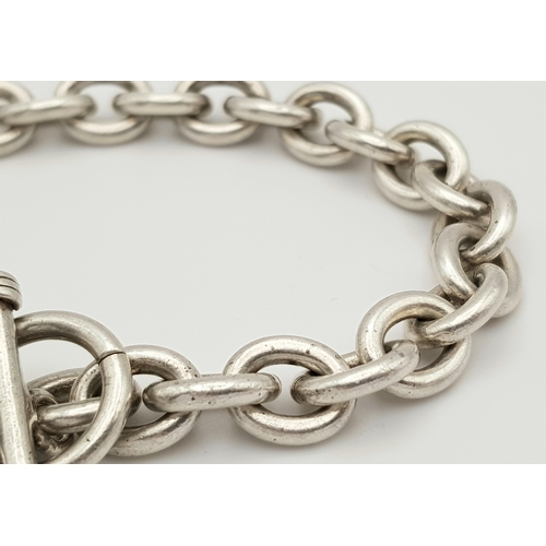 365 - A Chunky Solid Silver 925 Attractive Bracelet, with T-bar and Heart Tags, 48 grams, 20cm. In very go... 