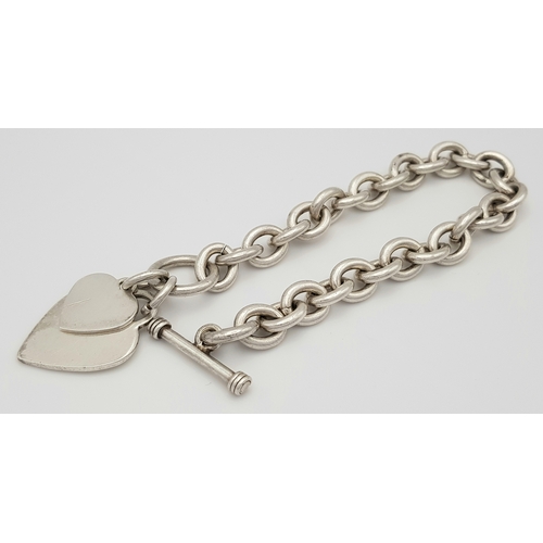 365 - A Chunky Solid Silver 925 Attractive Bracelet, with T-bar and Heart Tags, 48 grams, 20cm. In very go... 