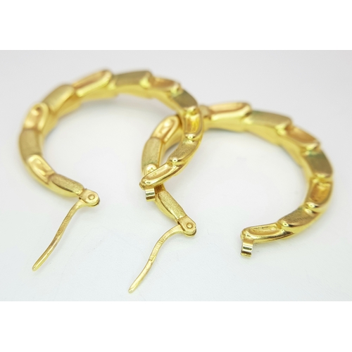 380 - A Pair of 9K Yellow Gold Creole Hoop Earrings. 3cm diameter.  2.8g