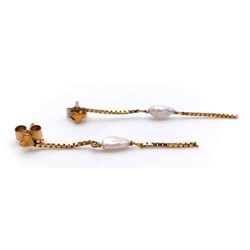 491 - A Pair of 9K Yellow Gold, Rice Pearl Drop Earrings. 3.5cm. 0.66g