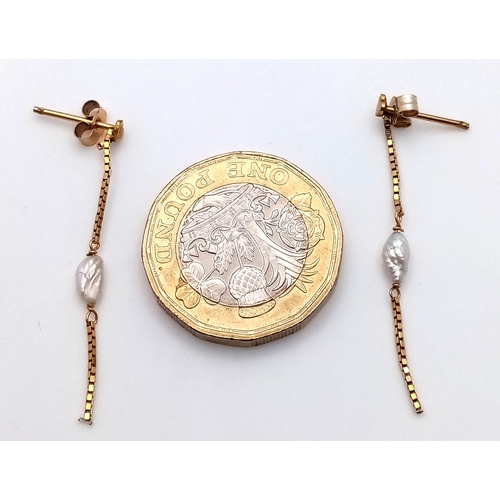 491 - A Pair of 9K Yellow Gold, Rice Pearl Drop Earrings. 3.5cm. 0.66g