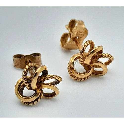 498 - A Pair of 9K Yellow Gold Knot Stud Earrings. 1.05g