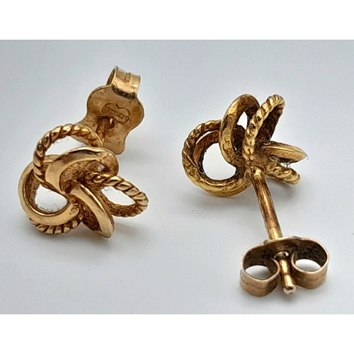 498 - A Pair of 9K Yellow Gold Knot Stud Earrings. 1.05g