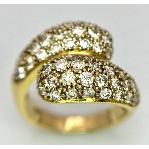 1400 - A WGI Certified 18K Yellow Gold Diamond Crossover Ring set with 64 Round Cut Brilliant Diamonds. 1.5... 