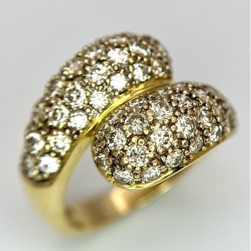 1400 - A WGI Certified 18K Yellow Gold Diamond Crossover Ring set with 64 Round Cut Brilliant Diamonds. 1.5... 