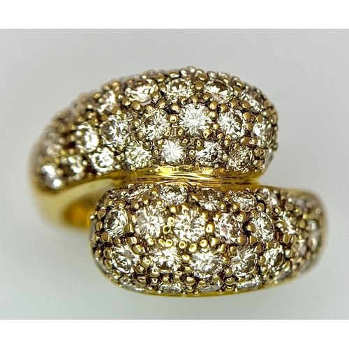 1400 - A WGI Certified 18K Yellow Gold Diamond Crossover Ring set with 64 Round Cut Brilliant Diamonds. 1.5... 