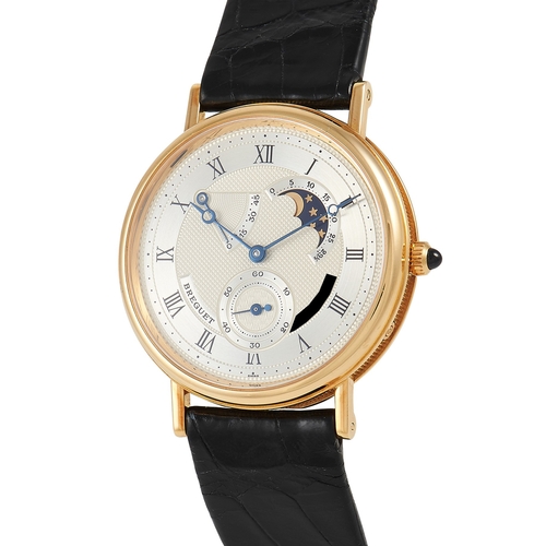 125 - A Breguet Classique Moonphase Hand Wind Watch. Model 3580BA 12 286. 35mm case in 18K yellow gold wit... 