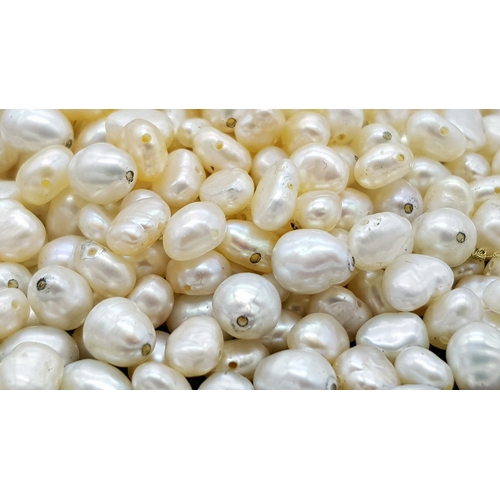 512 - A Collection of Cultured Rice Pearls. 100g