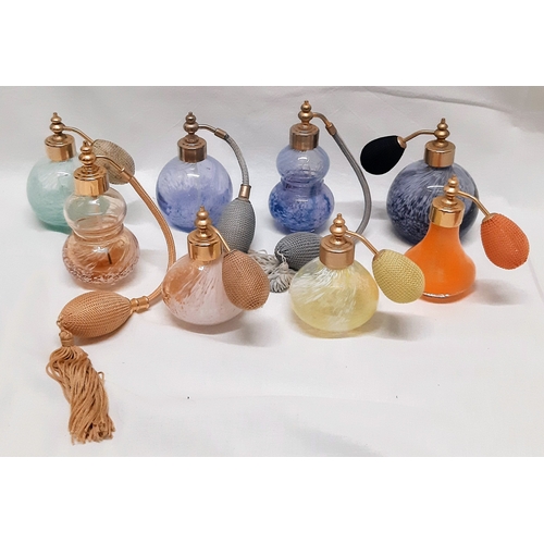 1675 - A collection of eight Caithness perfume atomiser's. A lovely range of colours including a rare orang... 