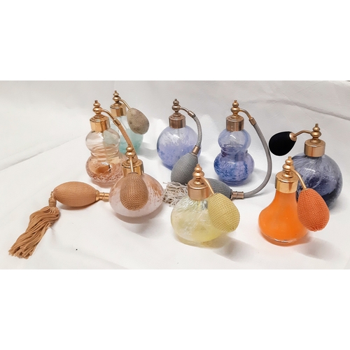 1675 - A collection of eight Caithness perfume atomiser's. A lovely range of colours including a rare orang... 