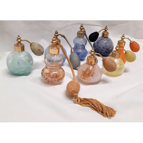 1675 - A collection of eight Caithness perfume atomiser's. A lovely range of colours including a rare orang... 