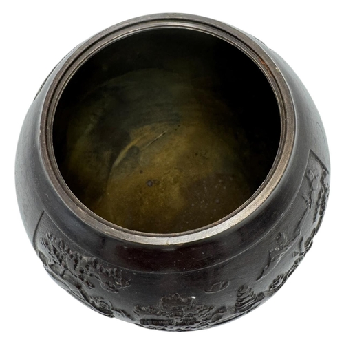 1702 - An antique Chinese Bronze Lidded Censer. Markings on base.
Bronze exterior with an intricate raised ... 