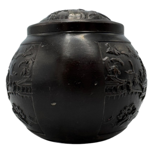 1702 - An antique Chinese Bronze Lidded Censer. Markings on base.
Bronze exterior with an intricate raised ... 