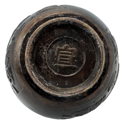 1702 - An antique Chinese Bronze Lidded Censer. Markings on base.
Bronze exterior with an intricate raised ... 